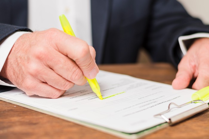 businessman-writing-documents (1) businessman-writing-documents (1)