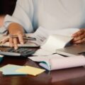 entrepreneur-working-with-bills (1)